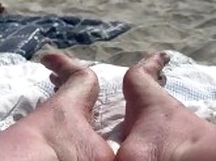 Relaxing at the Beach with My Toes in the Sand