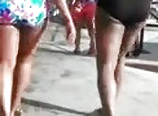Two amateur girls wearing swimsuits get caught on a hidden cam