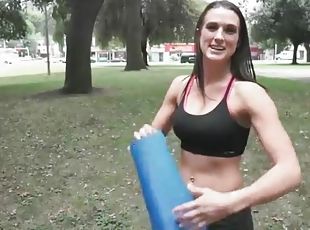 Misty Anderson does yoga in a public park