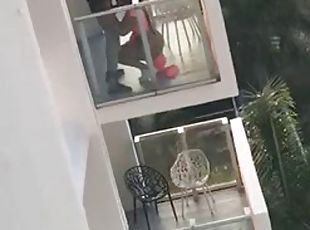 Neighbors caught having sex on balcony