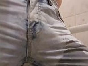 Pissing in tight fit jeans