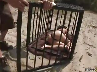 Hunter traps and cages a hot slut in a bikini