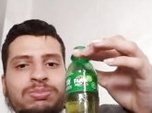 Man drinking a bit of soda to burp