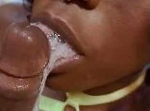 Black Teen playing with a mouth full of cum