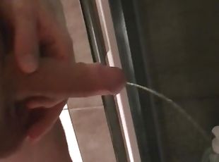 PISSING AT SHOWER ROOM