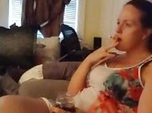 Pretty girl smokes in night dress on the couch part 3