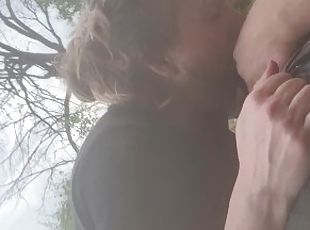 Blowjob by the river