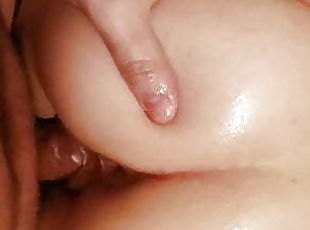 Fingering and then fucking her oiled pussy