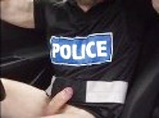 Muscular cop parks up on a busy road, turns himself on feeling his muscles then shoots a huge load
