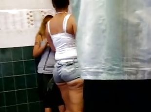 Big-assed chick in shorts gets caught on a hidden cam