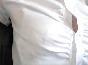 Crossdresser (light-blue bra is seen through the blouse)