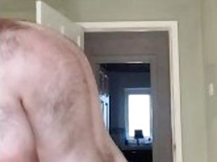 Hairy tubby exhibitionist guy working naked