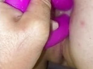 Double penetrated with double dildo filling both her holes
