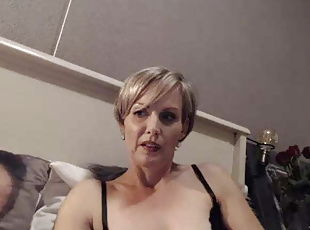 Hot blonde MILF teasing and masturbates on webcam