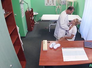 Doctor and his nurse are feeling a bit horny and decide to have sex