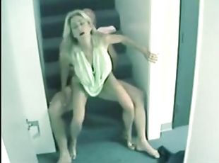 Amateur blonde blows and gets fucked doggystyle on the stairs