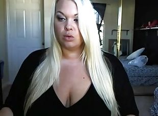 Hefty blonde plays with her pussy in homemade solo clip