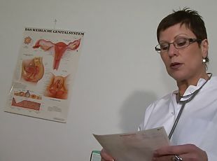 Short-haired MILF doctor with a wet pierced pussy masturbating