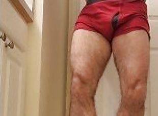 Hairy muscle bear flexing in red boxer briefs