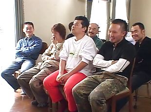 Married Asian MILF used by a large group of men while hubby watches