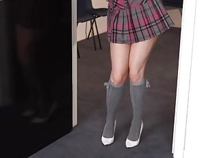 Pigtailed schoolgirl redhead is amazing in a miniskirt