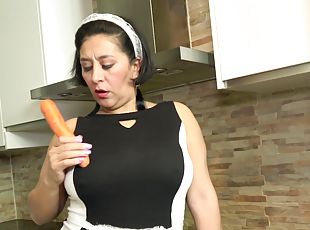 old maid finds a carrot and she's willing to use it in sexual purposes