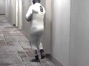 horny wetsuited armed guard patrolling hotel hall