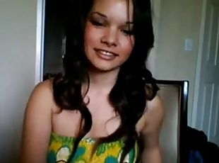 Sexy busty brunette babe on webcam teasing and seducing with her tits