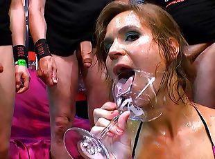 Her mouth and hands are busy when she does an oral gangbang