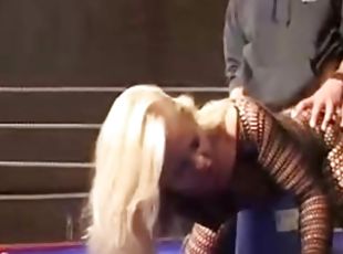Big boned guy fucks a hot blonde cleaning lady on the boxing ring