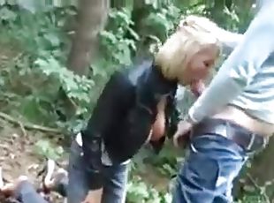 Deutsch blonde sucking and fucking a giant pecker in the woods