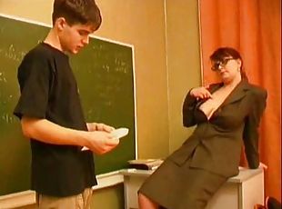 Mature teacher is seducing her student