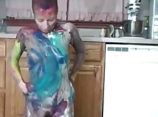 She covers her body in paint