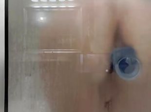 Riding dildo in shower
