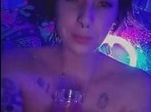 Stoner Girl Takes a toke with Nipples Out