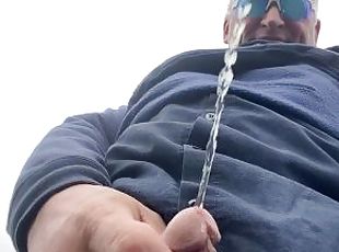 Peeing in public and playing with my cock